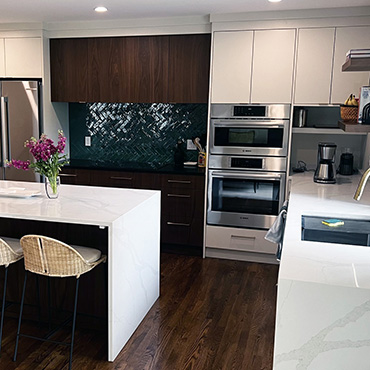 Kitchen remodel project, island, concealed exhaust hood, white and wood cabinets